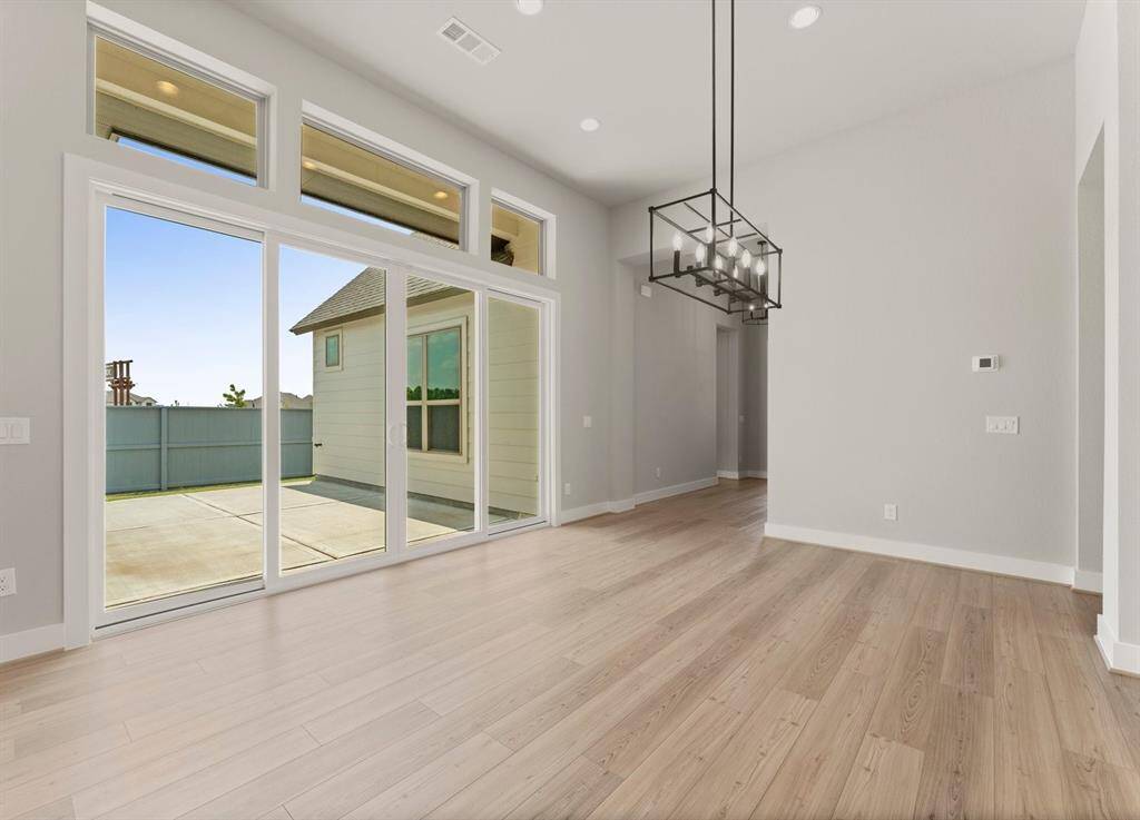 Dining with Access to Side Patio Allowing You the Choice to Dine Alfresco As Well