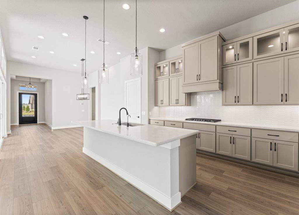 Sitting Space for Stools at the Kitchen Island with Pendants