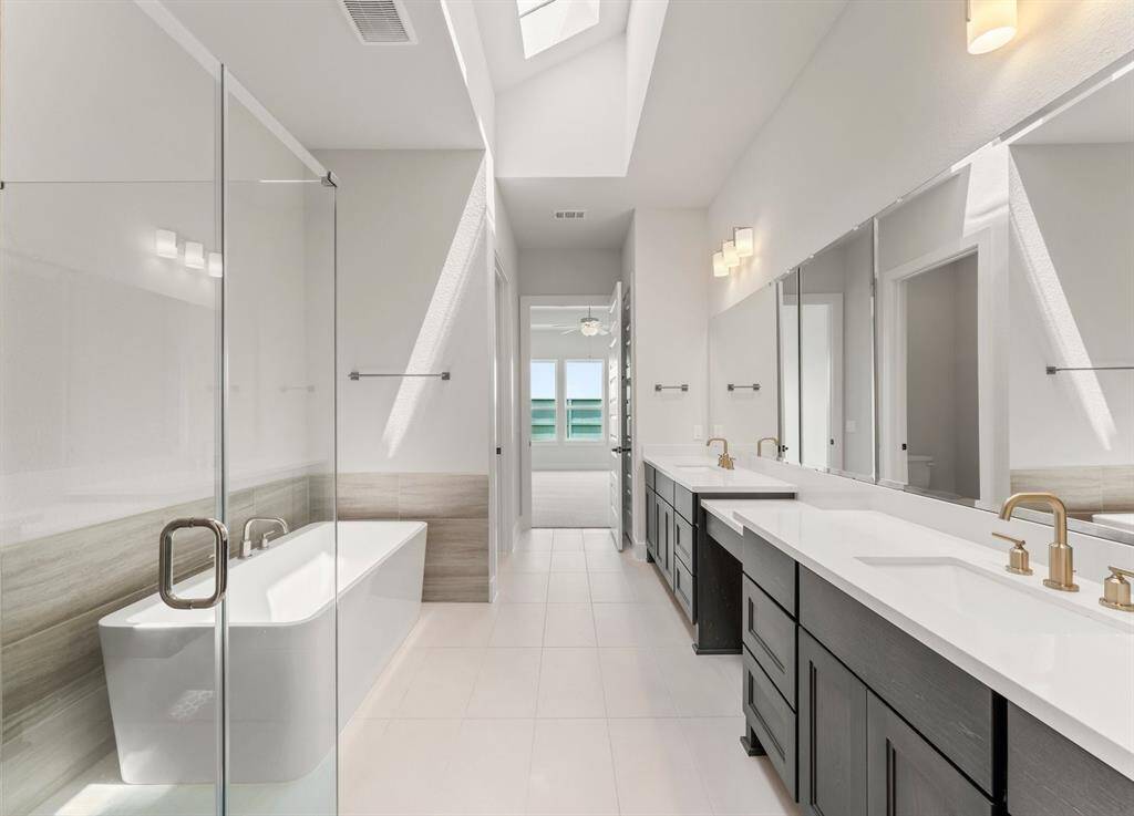 Primary Bath with Skylight, Double Sinks, and Built-in Make-up Vanity