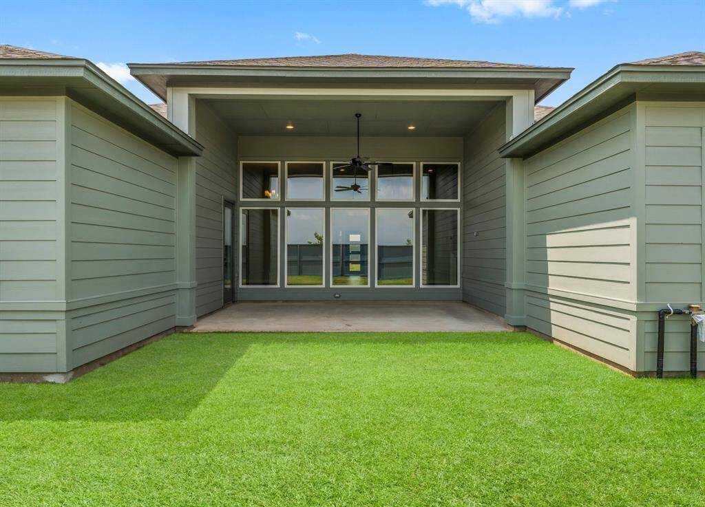 Covered Rear Patio with Fan