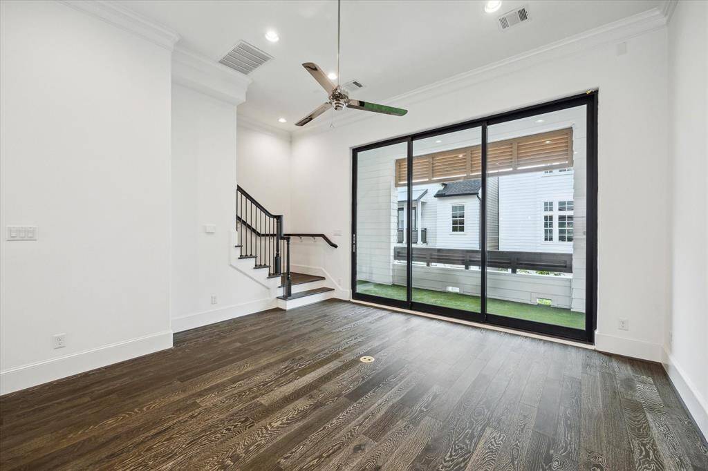 Second floor spacious living that opens to large covered patio