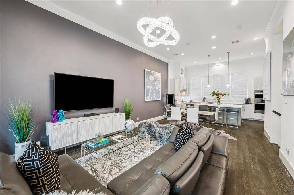 Previously furnished living room - accent wall has been painted back to white.