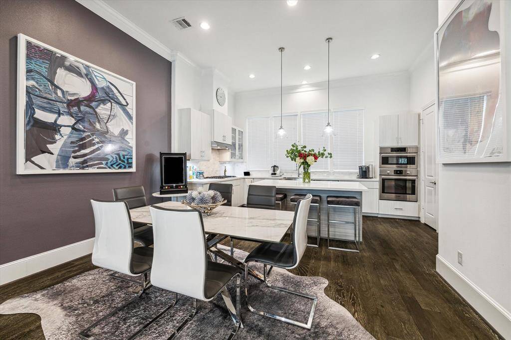 Previously furnished dining area off of living/kitchen