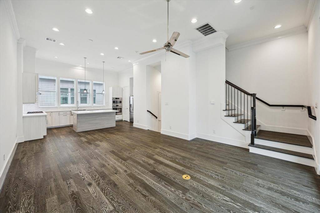 Second floor spacious living that opens to large covered patio