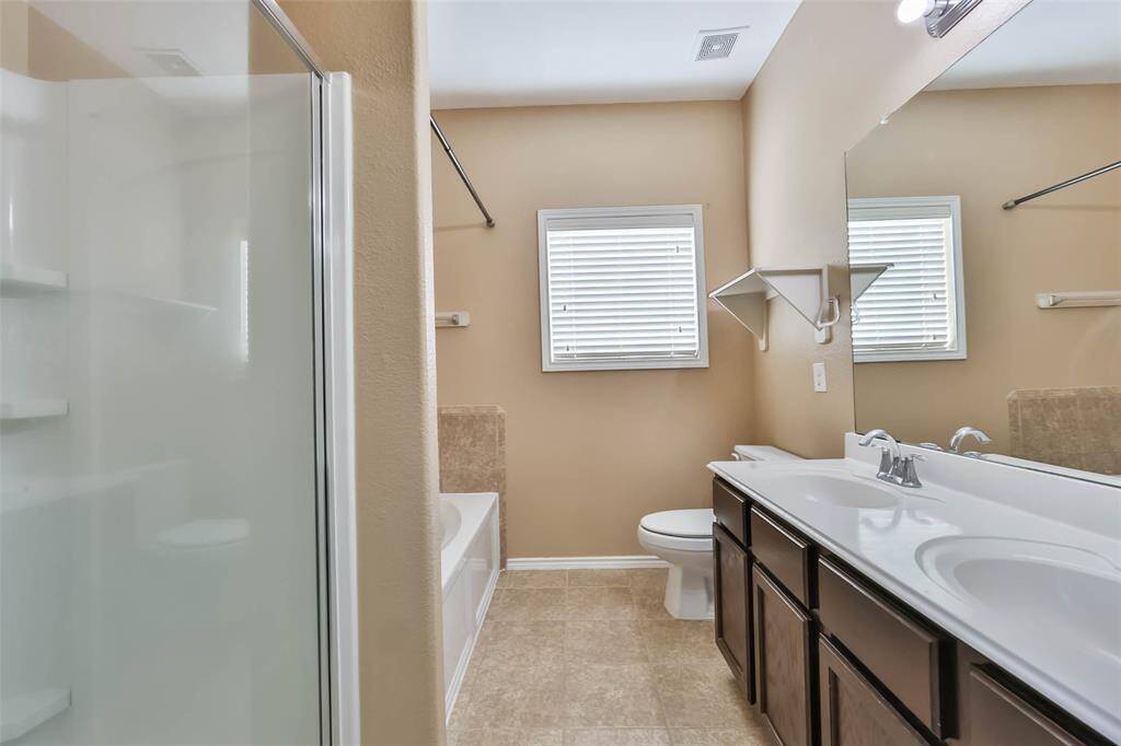 Primary Bath with separate tub and shower, dual sinks