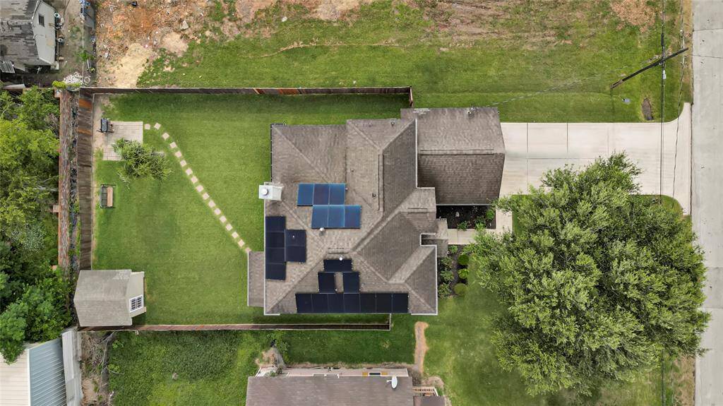 Large fenced yard and solar-equipped roof. Plenty of space and energy savings.