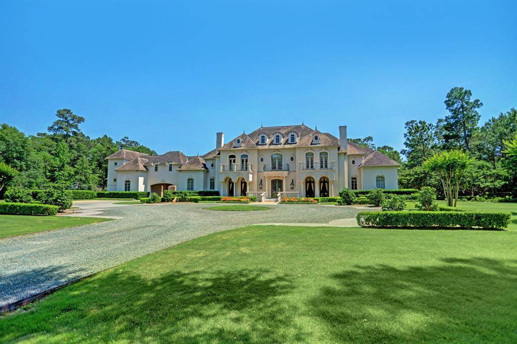 Secluded and private, yet conveniently located with easy access to The Woodlands and Grand Parkway. A grand circle driveway leads to the stately French estate, offering an impressive first impression.