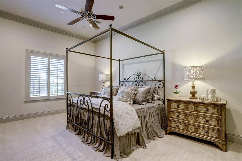 Spacious secondary guest suite downstairs with a primary-sized ensuite bath.