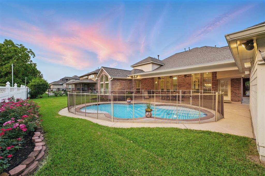 Welcome to this stunning 4138 sf estate in gated Audubon Place.