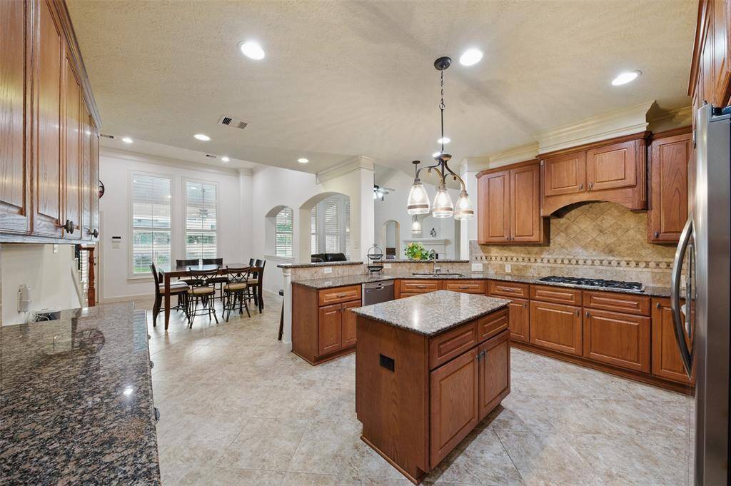 Kitchen overlooks the breakfast room and living room.