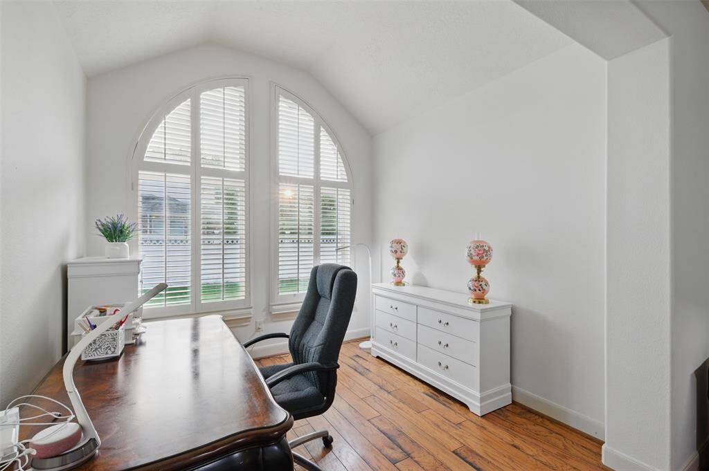 Separate sitting area off of the primary bedroom - perfect place for an additional study, workout  room, or just a quiet place to curl up with a good book.