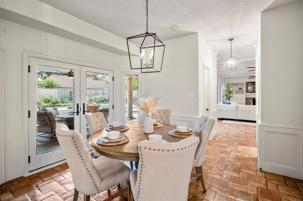 Just off the breakfast room you have double French doors that lead out onto the covered patio.
