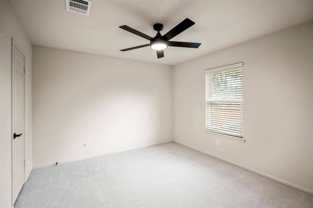 The third bedroom upstairs offer a light and bright room with new ceiling fan, recent carpet and paint and a nice size closet which has new Elfa closet systems.