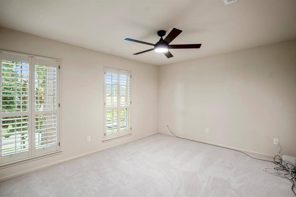 The third  bedroom upstairs offer a light and bright room which also has the double-paned windows, new ceiling fan, recent carpet and paint and a nice size closet which has new Elfa closet systems.