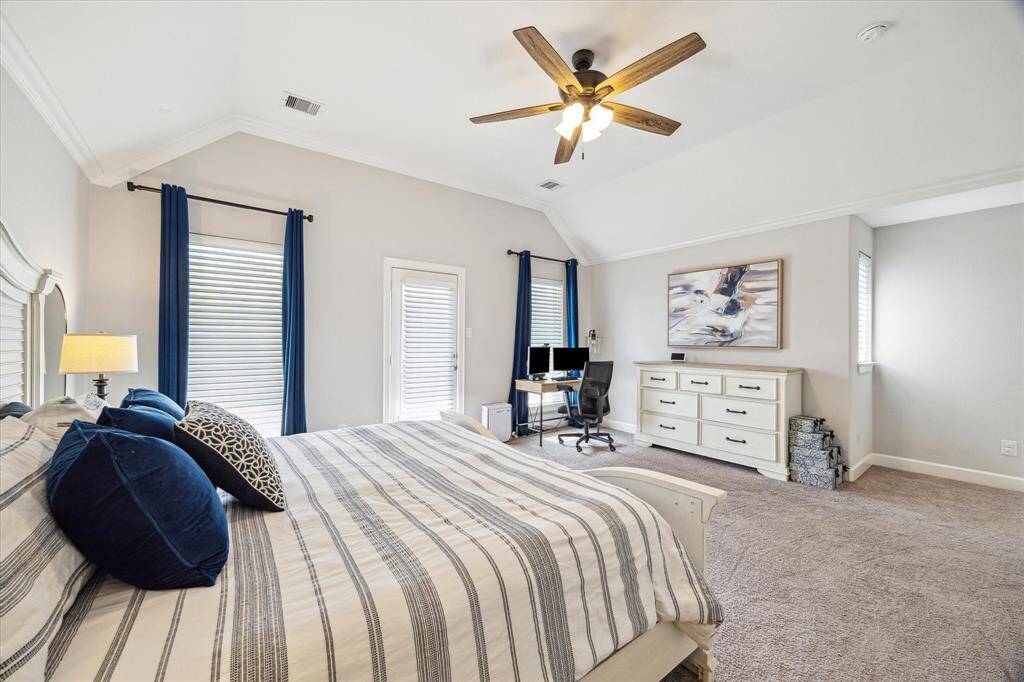 Sizable primary bedroom from another angle.