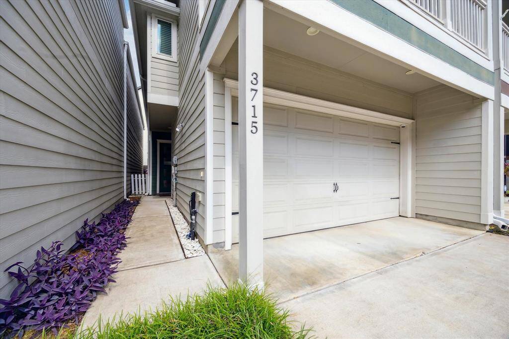 Picture of the walkway leading to the front door of the property.