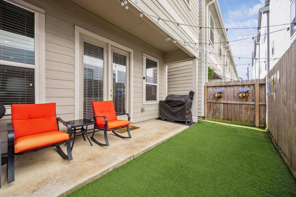 What a great space!!! Windows and double doors at rear are double paned low e vinyl windows. The back yard and back covered patio (19x5). Back yard is turfed to allow for additional patio furniture and seating arrangements!