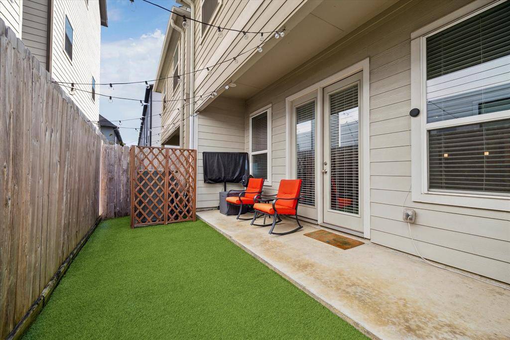 Opposite view of back patio. The lattice work covers the a/c condensing unit.