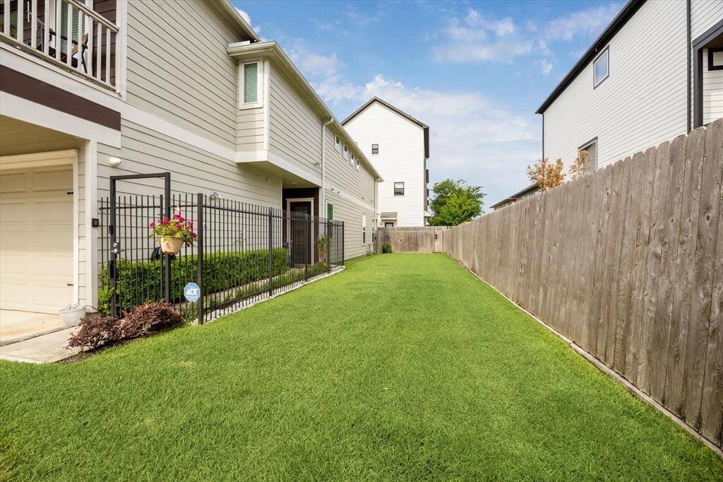 This green space is at the far (north) side of the homes and to the west of the picnic area.