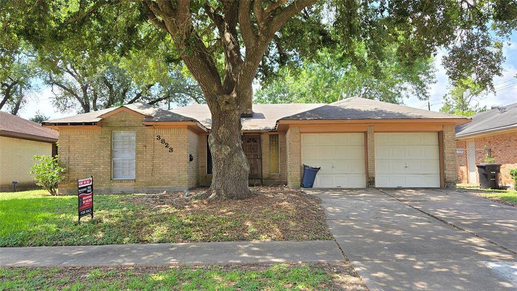 Investor Alert! Curb appeal with serious upside – unlock the potential in this prime fixer upper located on a wide, tree-lined street surrounded by pride of ownership!