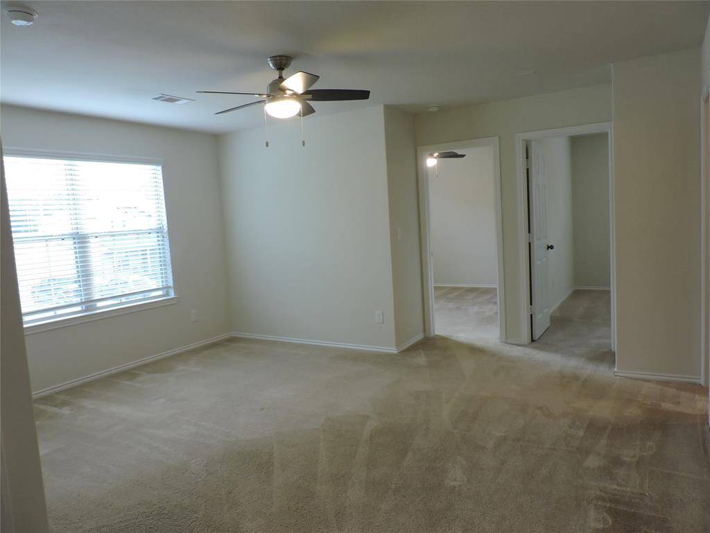 you enter the game room or second living area surrounded by secondary bedrooms