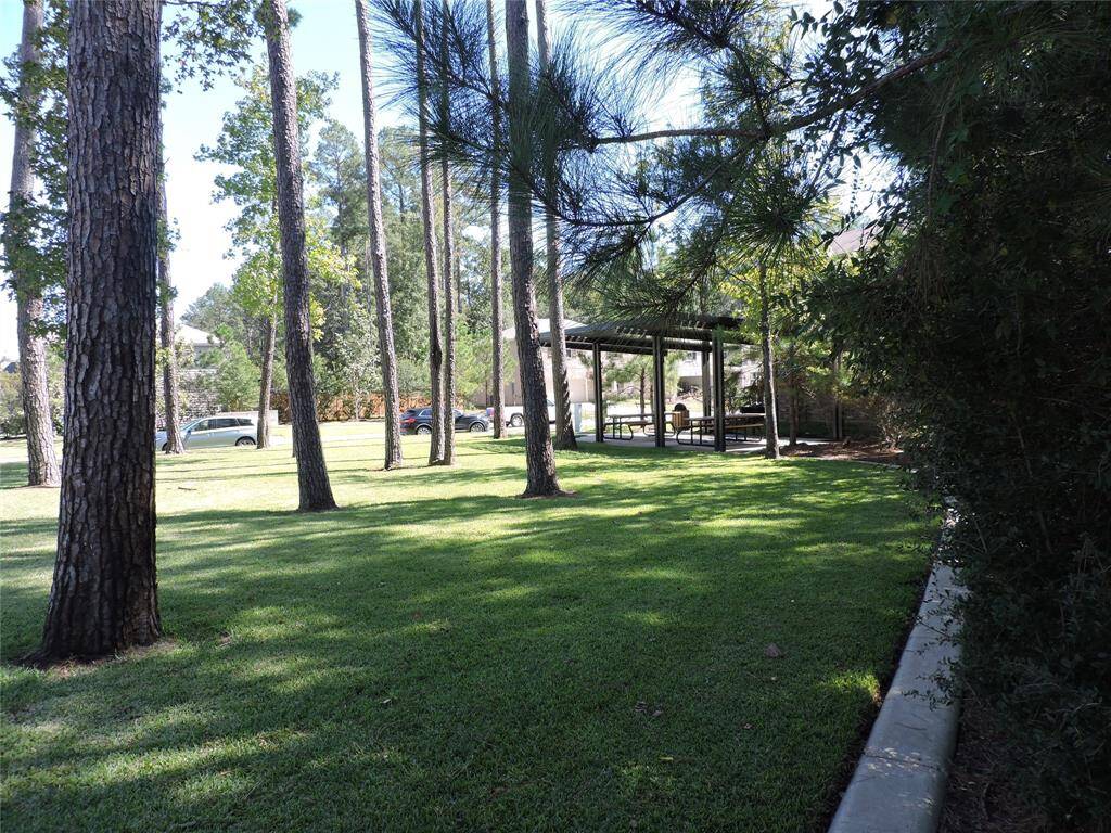 Enjoy the amenities of The Woods of Conroe plenty of sidewalks for walking, covered picnic area at the park