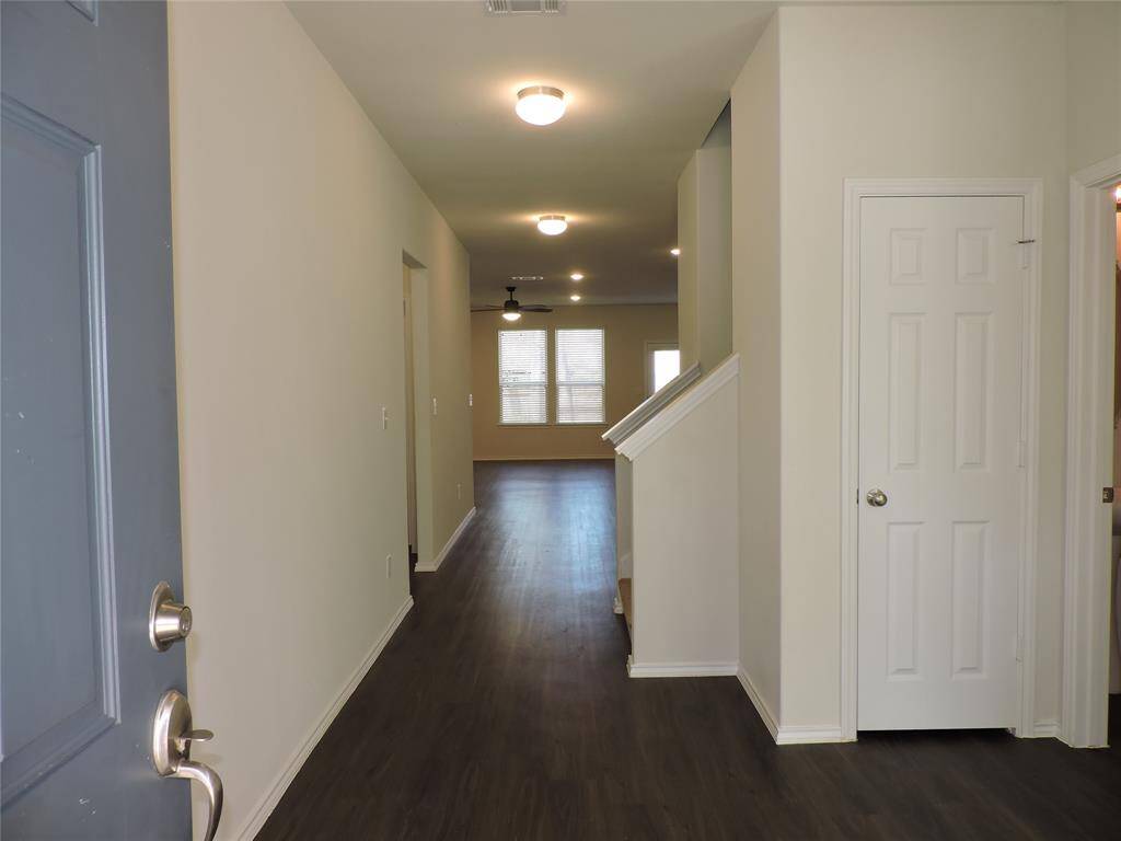 Upon entry your friends and family will be drawn to the open living spaces at the back of the home, to the immediate right is the Home Office, flex room, play room and also half bath, large storage closets in bath and hall.