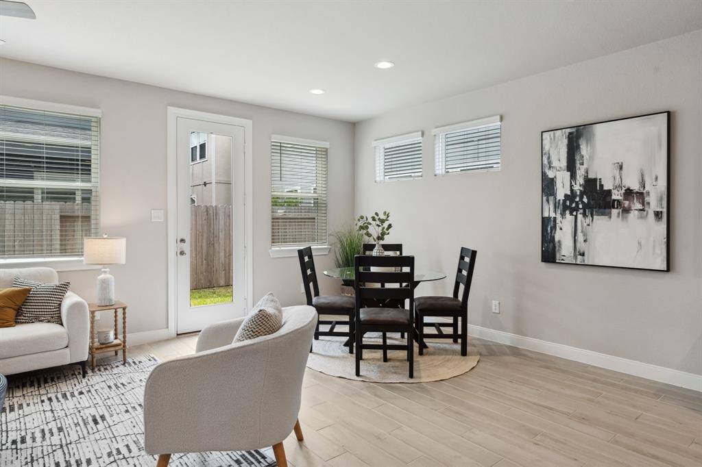 The living room connects to the dining area.