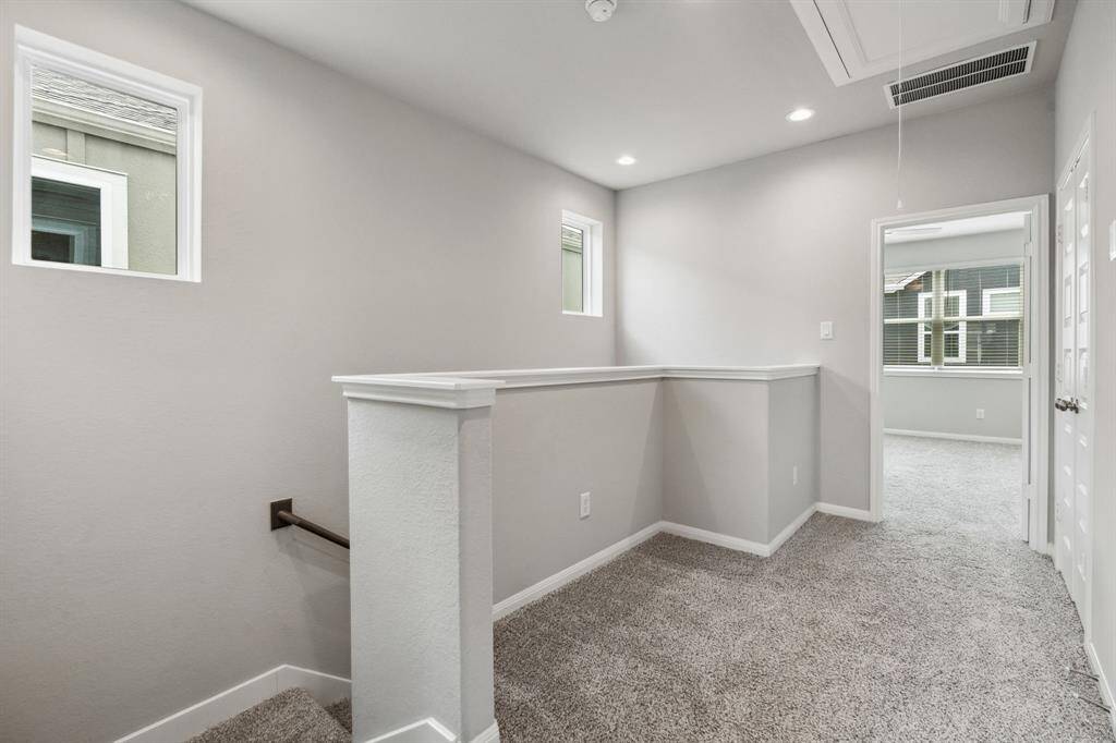 Right upstairs is plush carpet and the bedrooms.