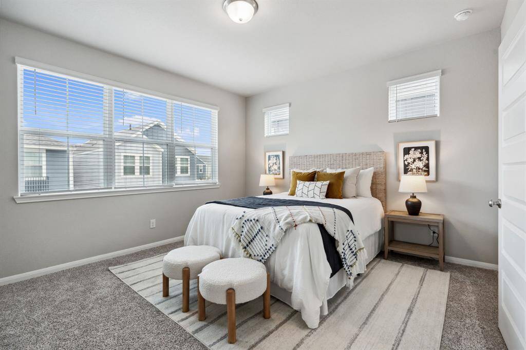Step into the sanctuary of the first primary bedroom.