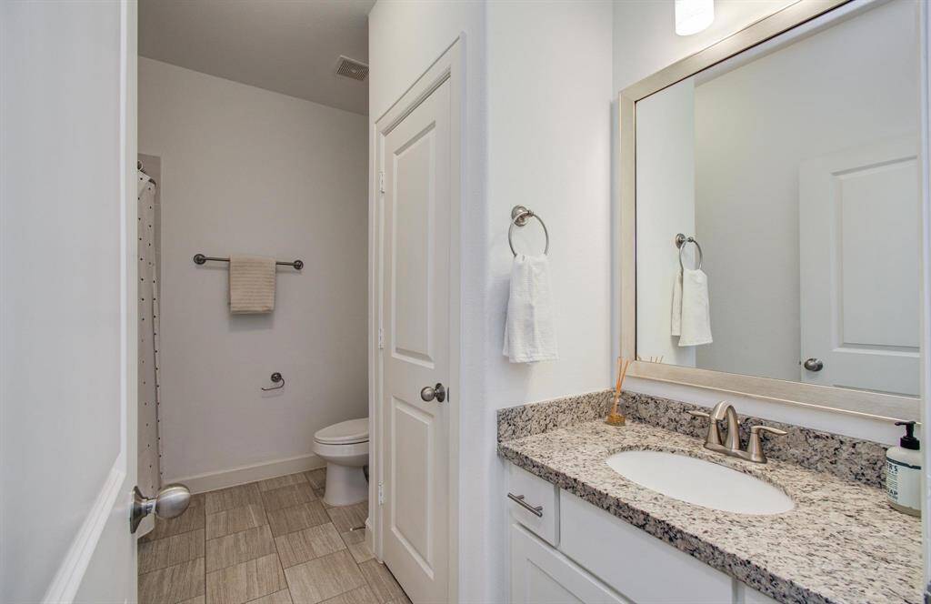 Second-floor secondary bathroom.