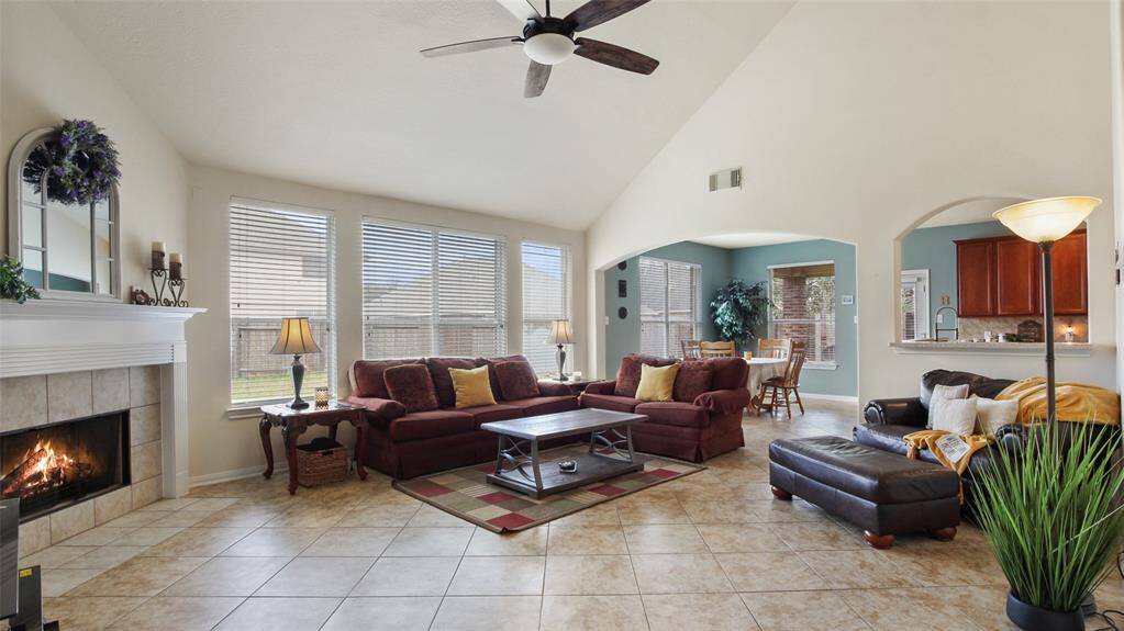 Incredibly spacious living room with vaulted ceilings and fireplace.