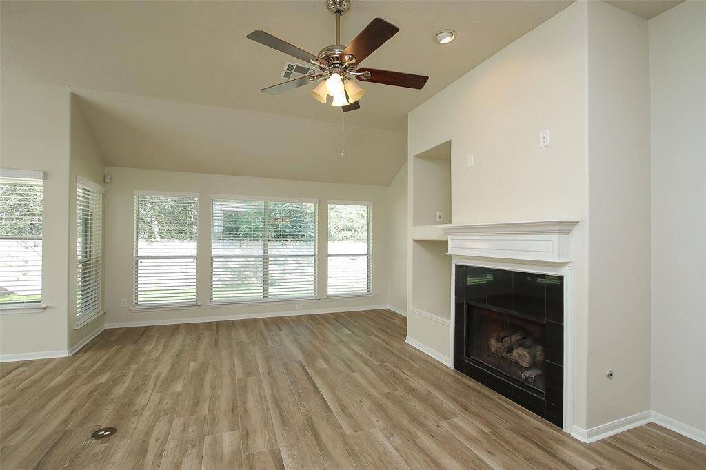 Open and Bright Den with Gaslog Fireplace.