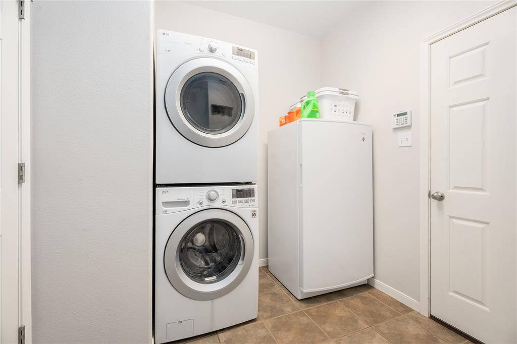 Large utility room leading out to the garage.