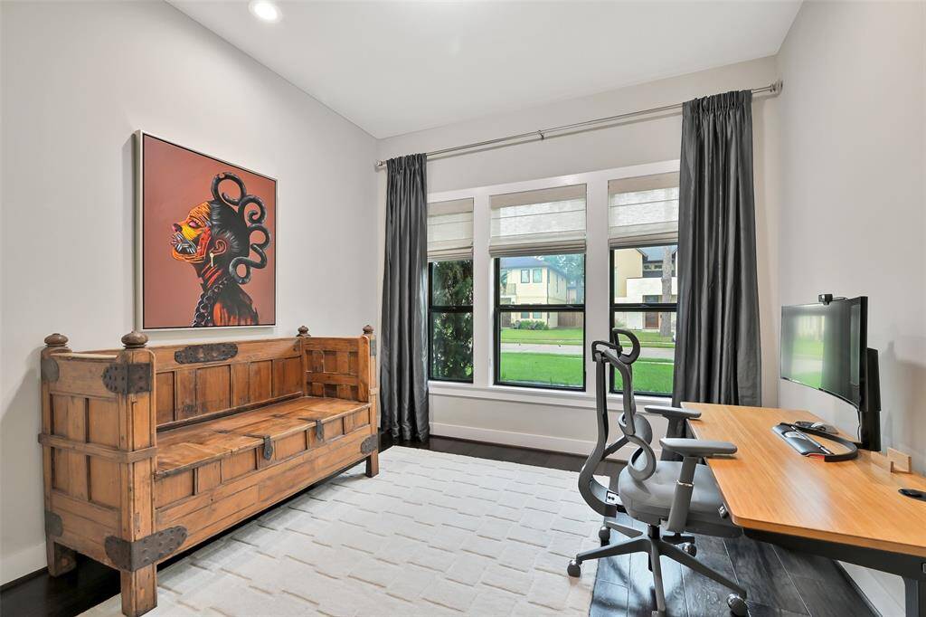 Home office/study is at the front of the home off the foyer over looks front yard.