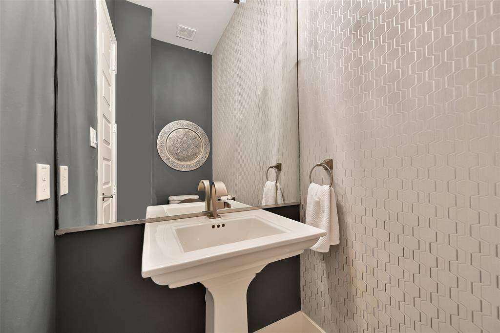 Powder bathroom with modern style finishes.