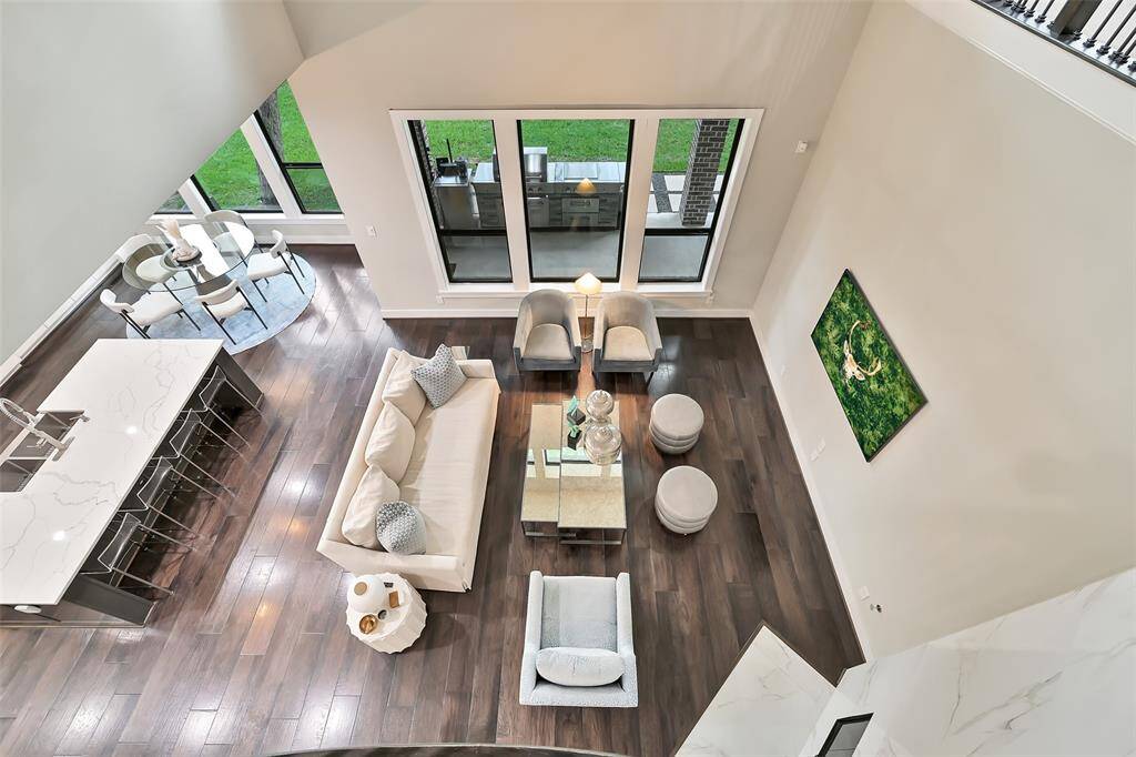 View of living room, kitchen and breakfast area.