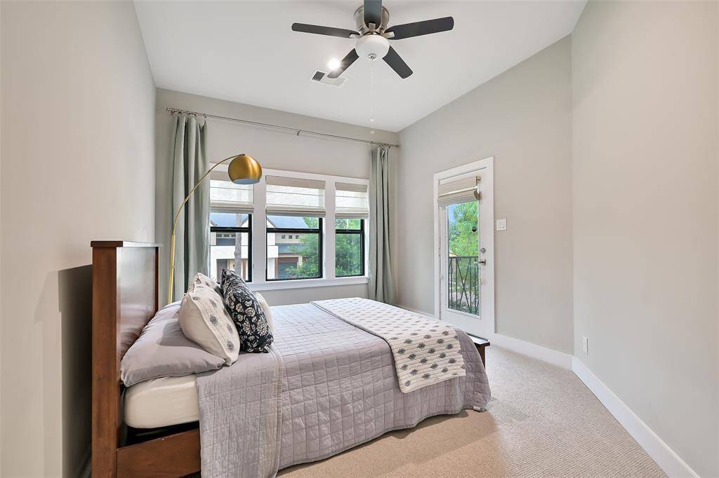 Secondary bedroom with access to balcony.