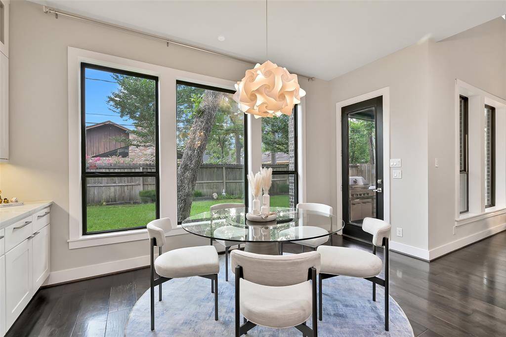 Breakfast area overlooking the backyard and access to patio.