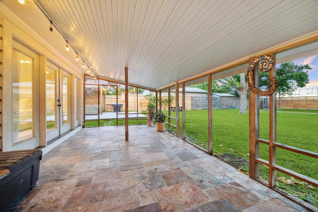 Covered patio off the primary bedroom