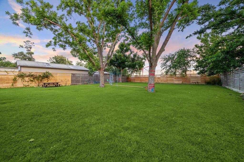 Look at this stunning yard. Wait until you see all the pecans that fall from this tree!
