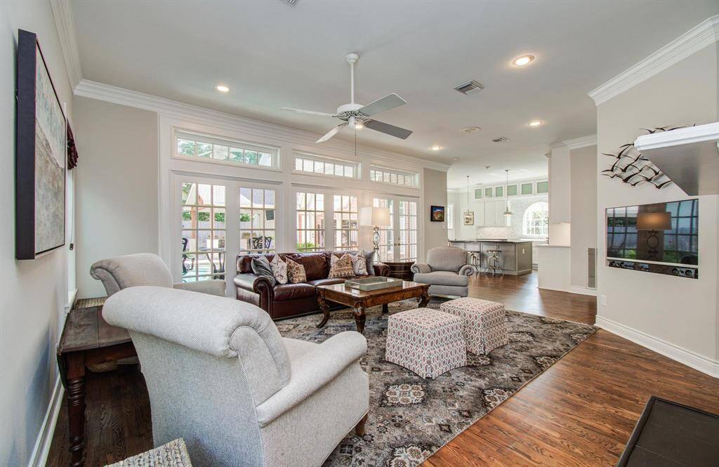 Family room opens to the kitchen area and overlooks the back yard/pool