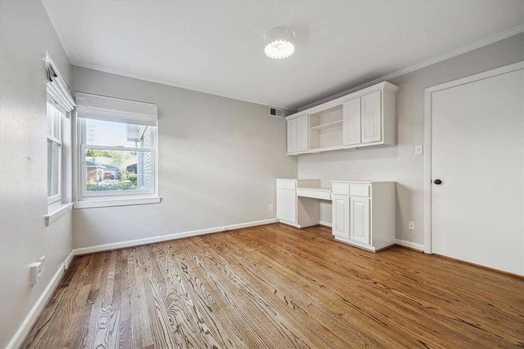 Secondary bedroom with built-ins.