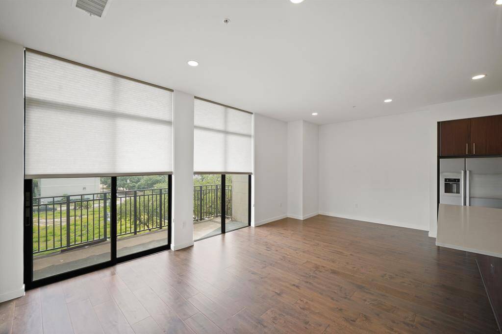 View of the living room coming from the primary bedroom.