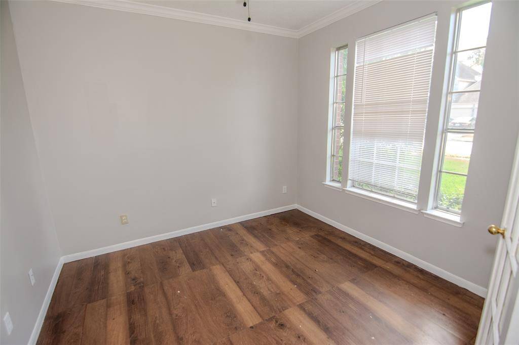 Walk into the Study past the French Doors for a quiet retreat.