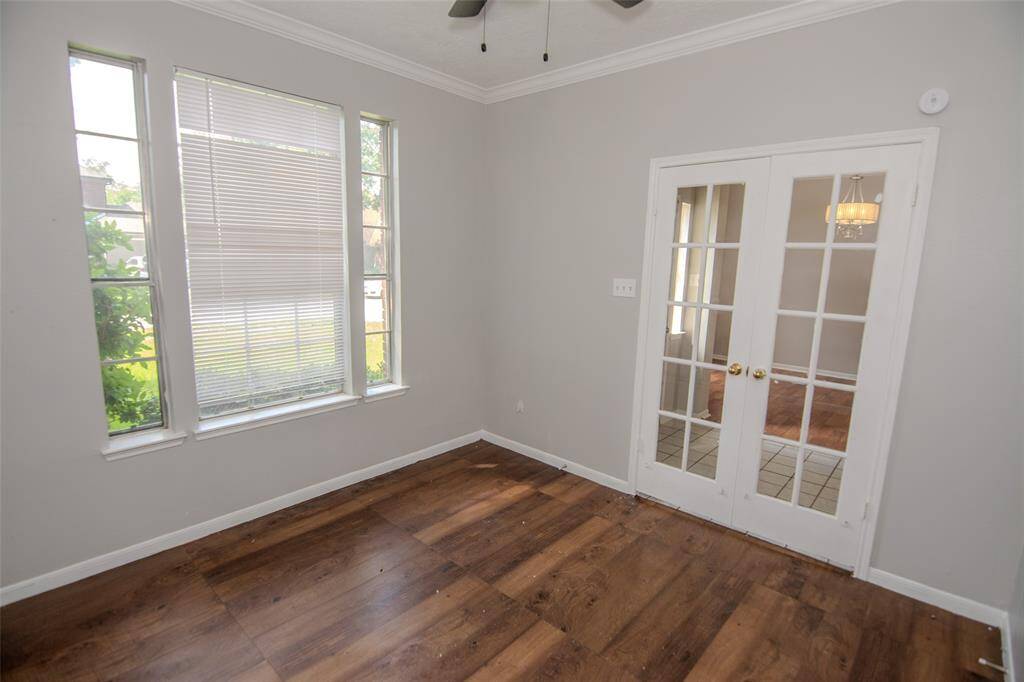 Walk into the Study past the French Doors for a quiet retreat.