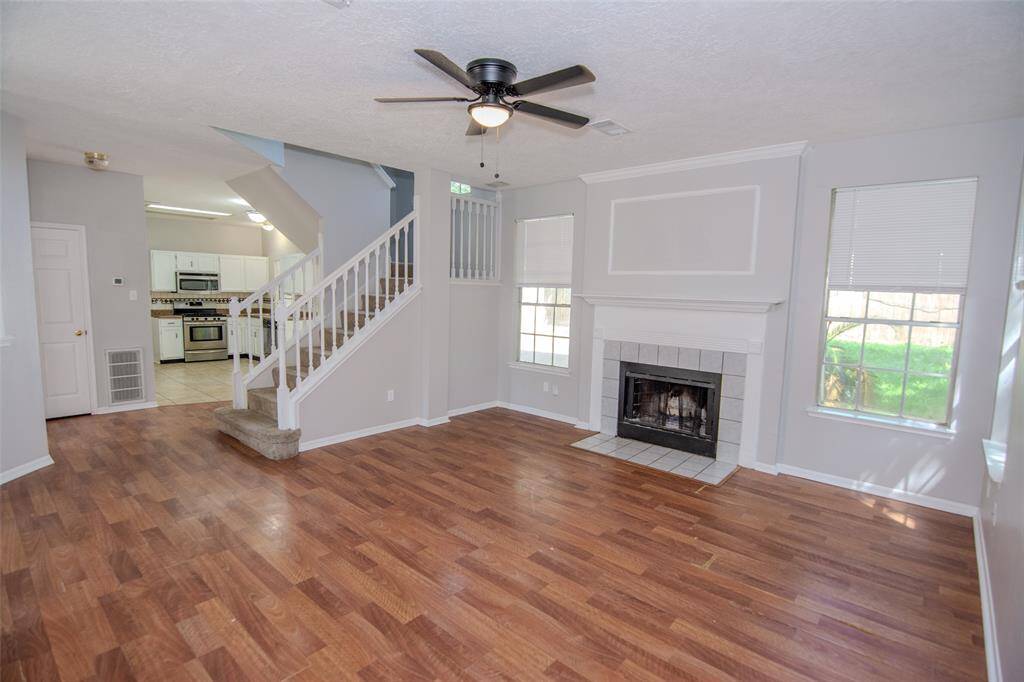 Large Living Room with High Ceilings and a warm fireplace