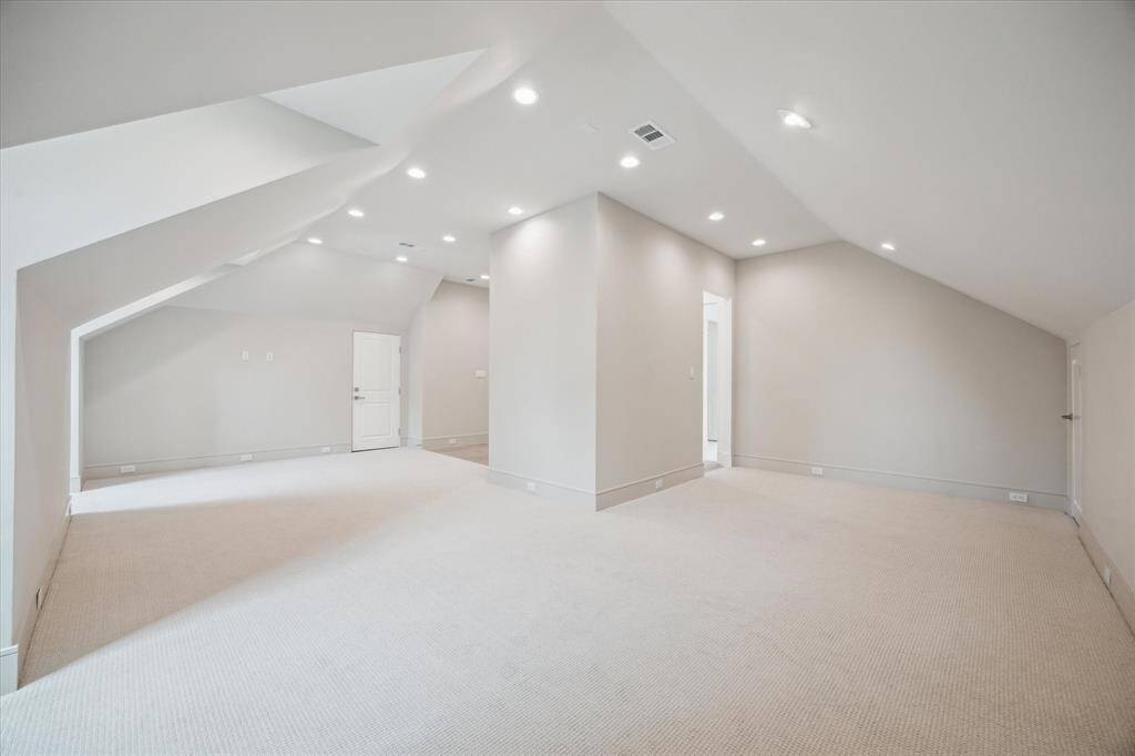 This space is plenty large enough to have a lounge area and a home gym or office, perfect for multiple uses.