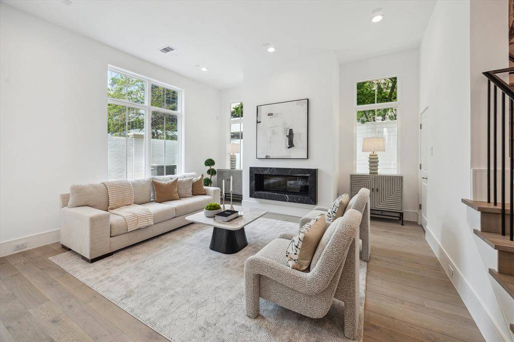 Plenty of seating available and close to French doors that lead to back yard.