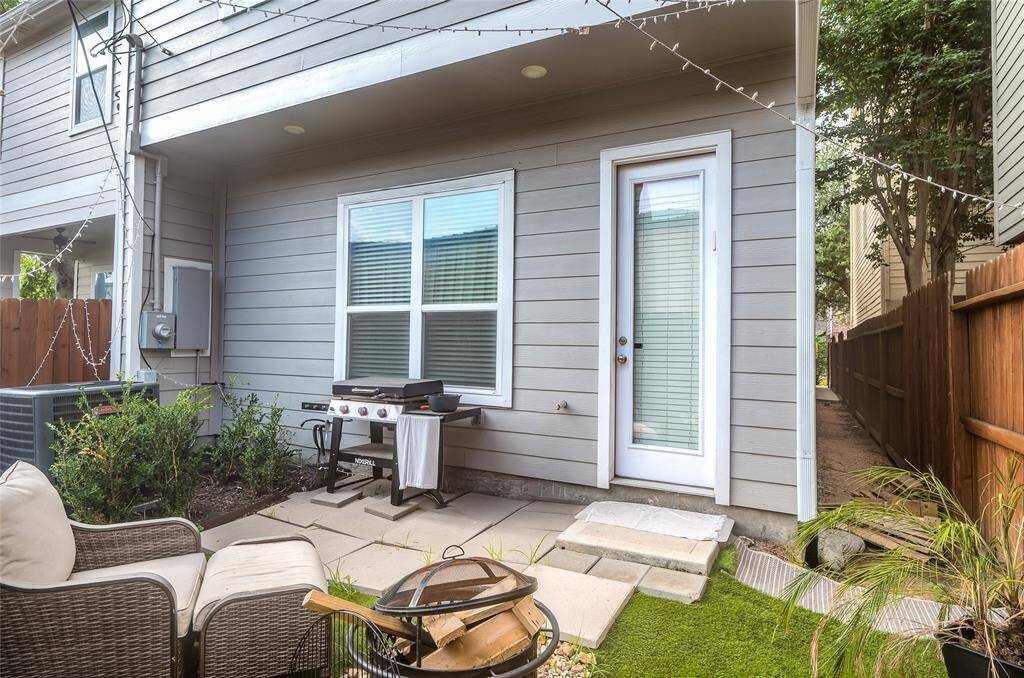 The backyard has enough space for a grill and seating, wonderful for entertaining.